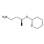 2-{[(2S)-4-aminobutan-2-yl]oxy}oxane