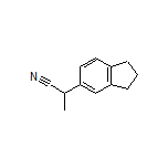 2-(2,3-Dihydro-1H-inden-5-yl)propanenitrile