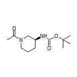 (S)-1-[3-(Boc-amino)piperidin-1-yl]ethan-1-one